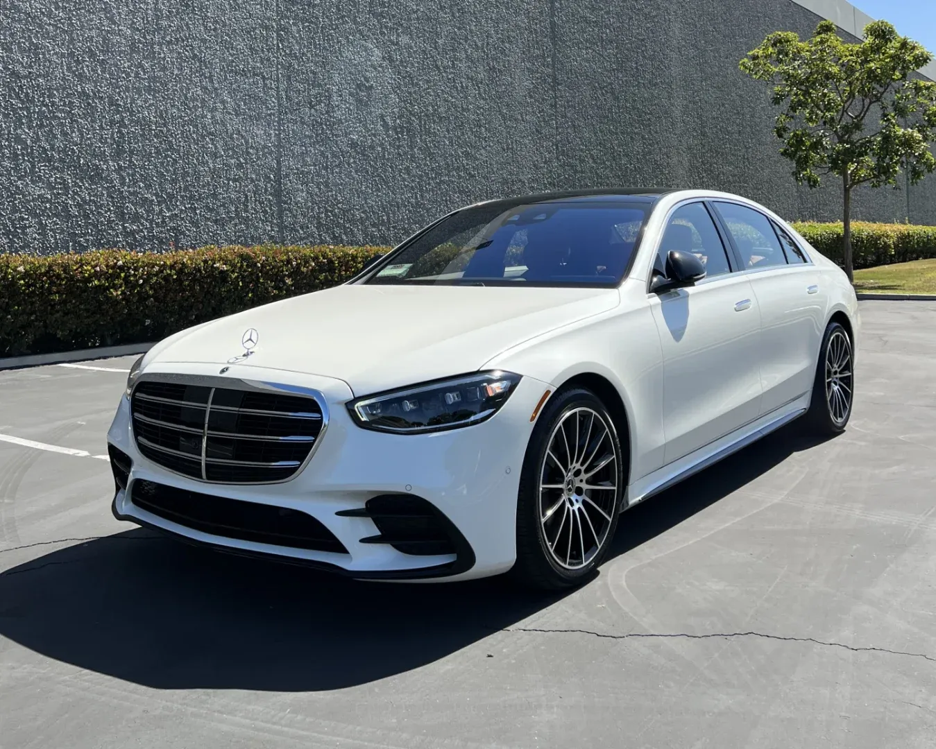 The same Mercedes-Benz S560 at delivery — front end rebuilt and refinished