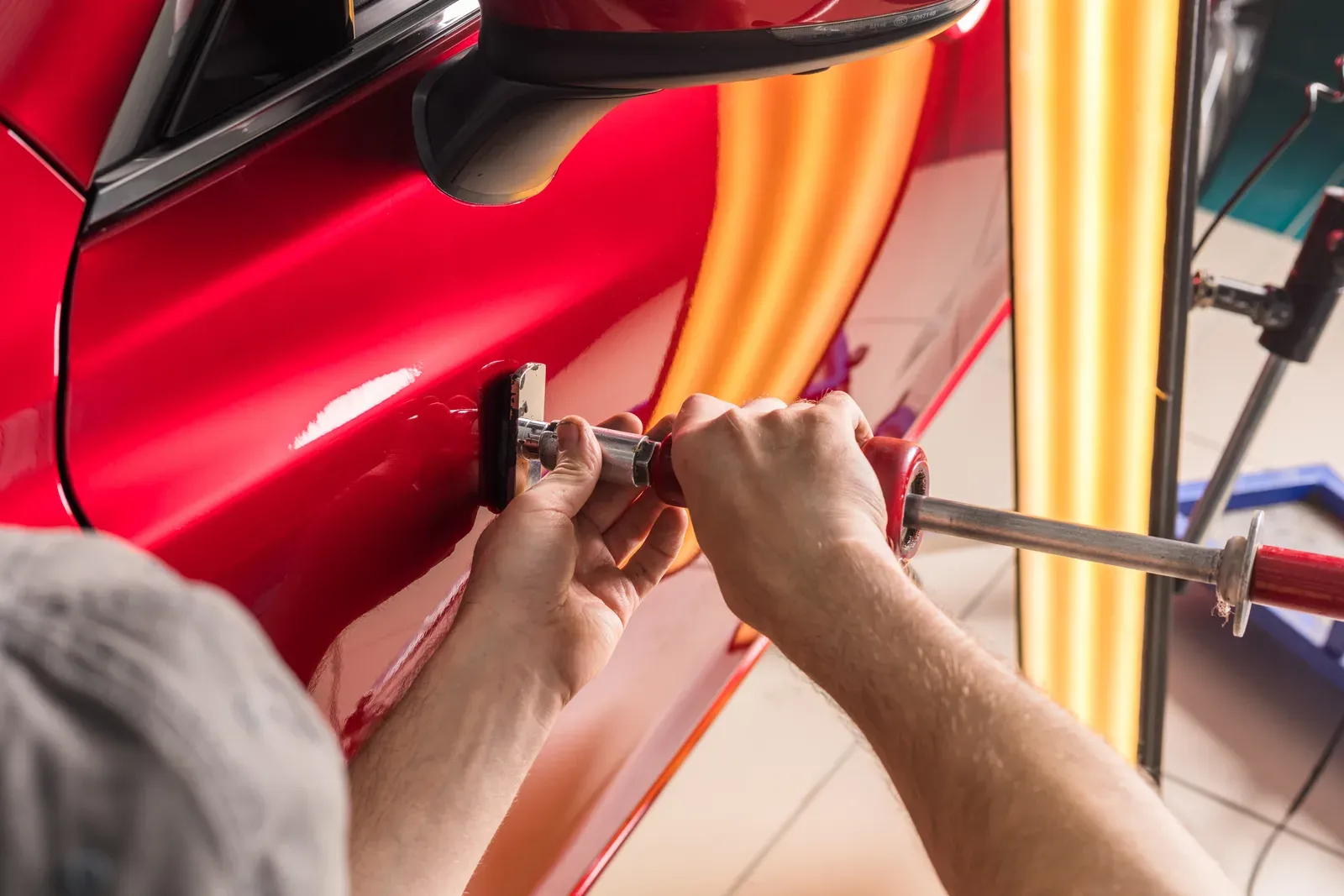 After: paintless dent repair — factory paint saved